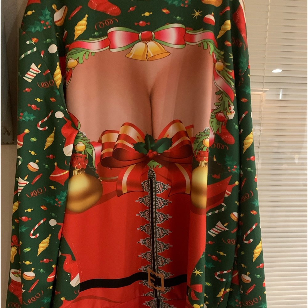 2XL Funny Polyester Shirt. Wore it for a ugly sweater party. Worn one time.